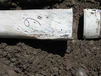 In this picture, the original joints were not glued, and the pipe was facing the wrong direction for water flow.